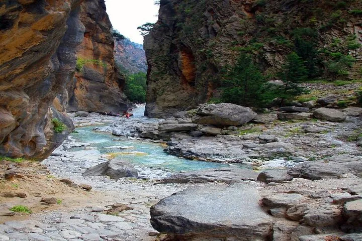 Wooden bridge over the dry riverbed in Samaria Gorge on a guided day tour, Crete Greece