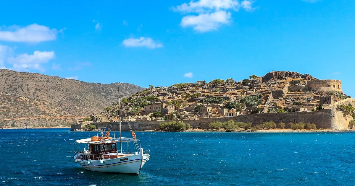 Harbour of Agios Nikolaos and Lake Voulismeni on a Spinalonga day trip, Crete Greece