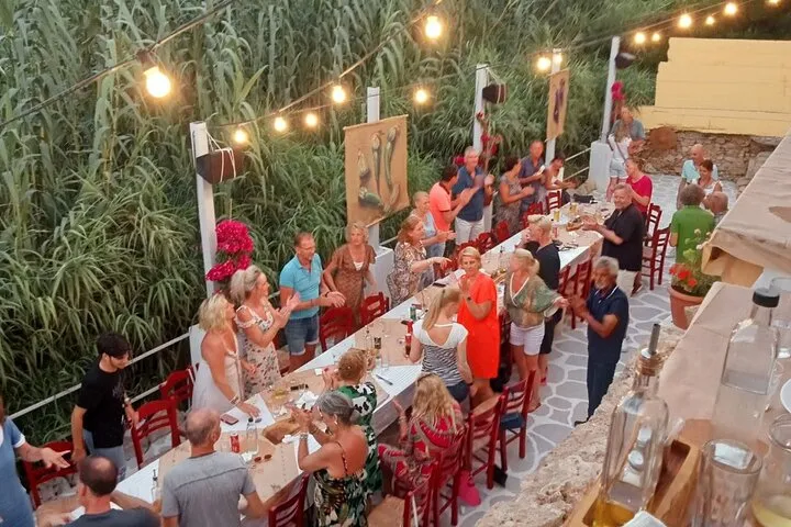 Dancers at a Greek night with plate smashing and buffet dinner, Crete Greece