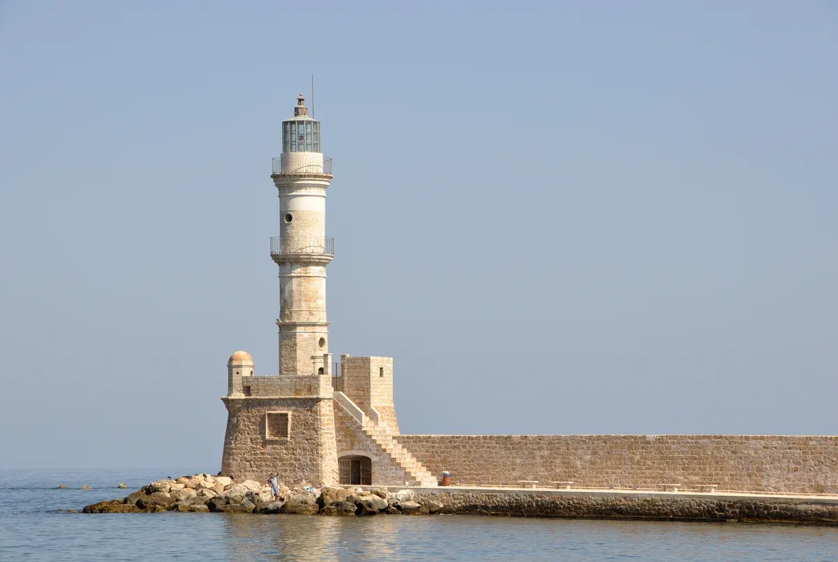 The Egyptian-rebuilt lighthouse at the mouth of Chania's old harbour, Crete