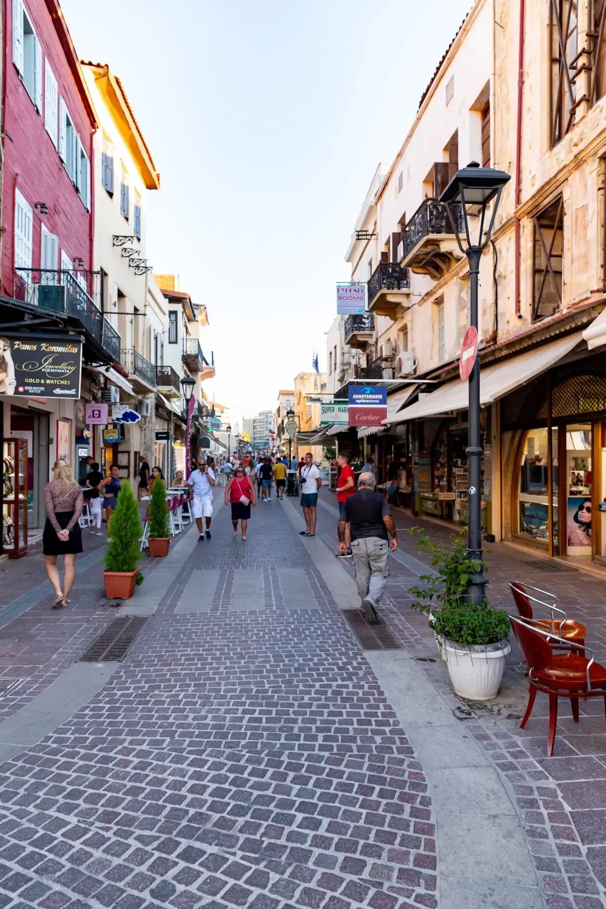 A shopping street in Chania's old town, the kind of narrow lane where a crete car rental is more hindrance than help