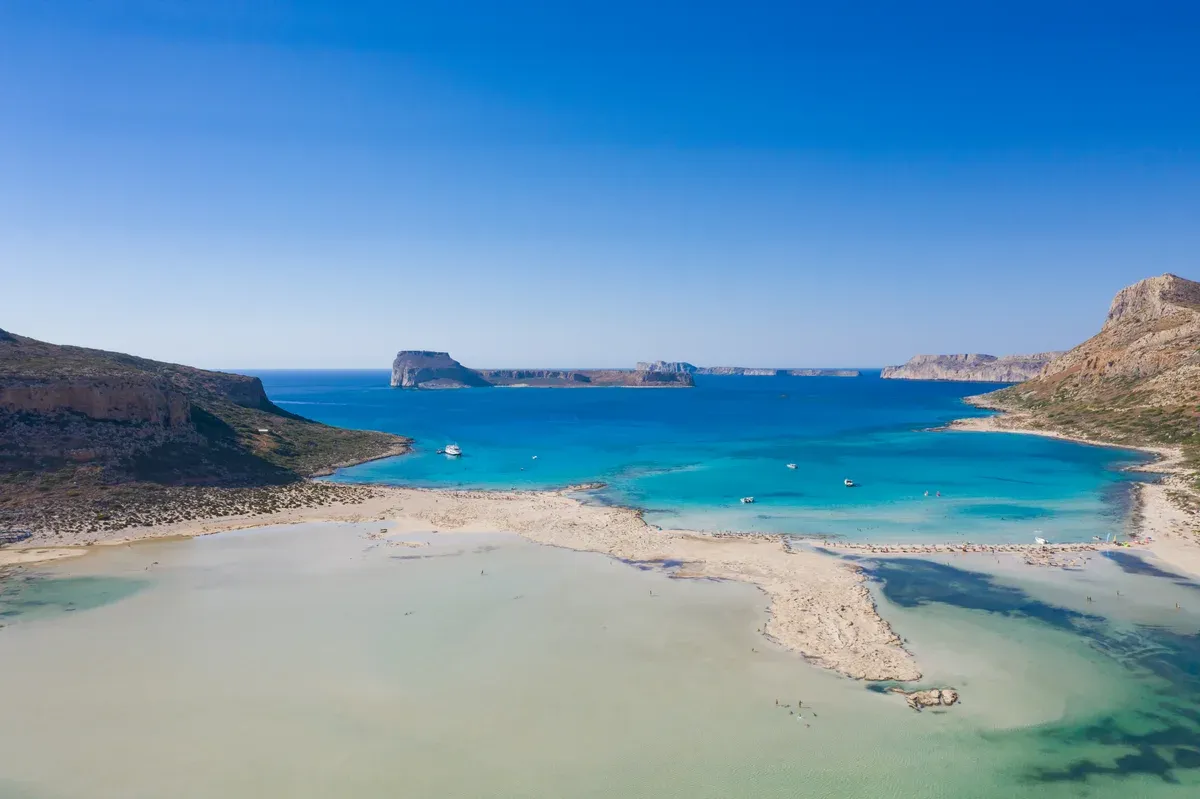 Balos lagoon's turquoise shallows, the start of many Crete tours boat days