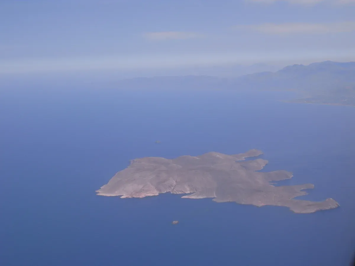 Aerial view of the whole of Dia island with the Crete coastline behind