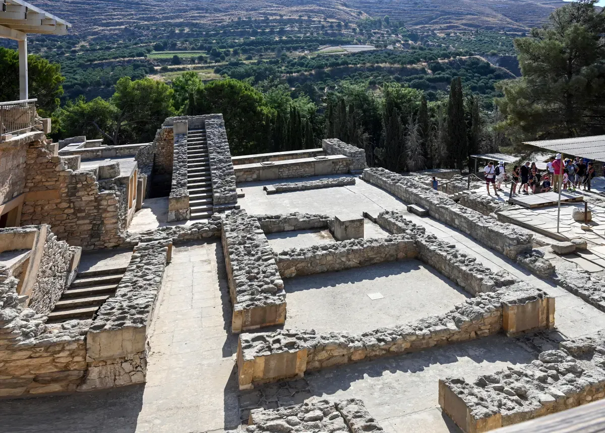 Grand Staircase and restored courtyard ruins at the Palace of Knossos, Crete