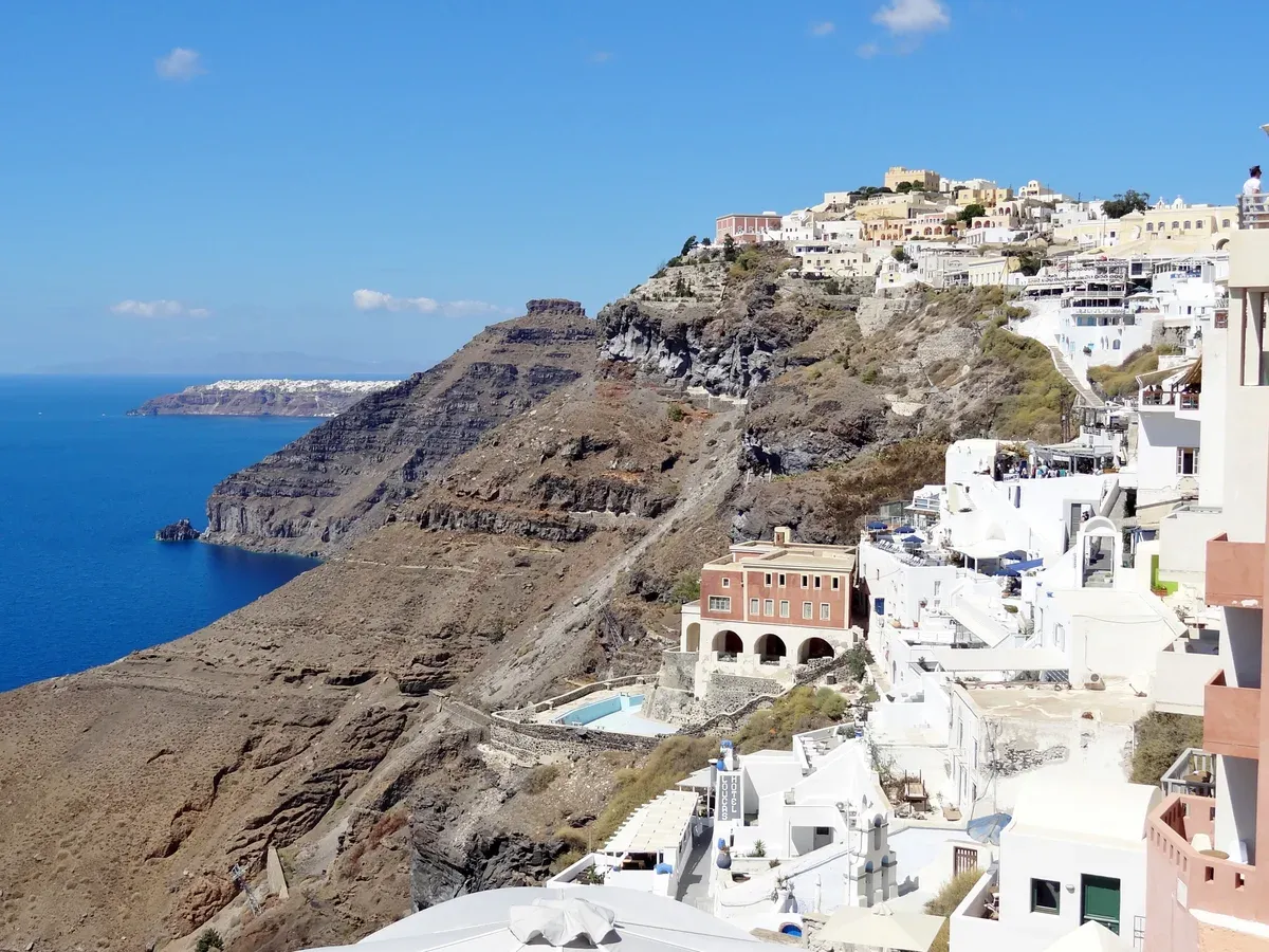Fira clinging to the caldera rim on Santorini, seen on a day trip from Crete