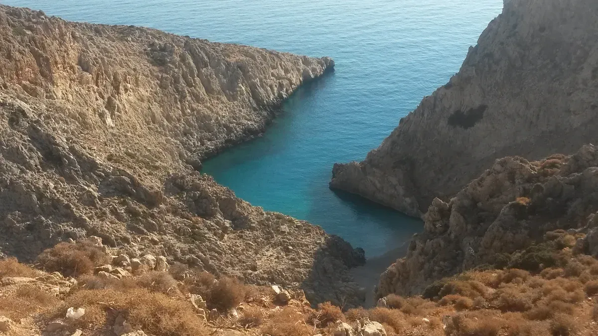 The two pocket coves and cliff path down to Seitan Limania beach, Akrotiri peninsula, Crete